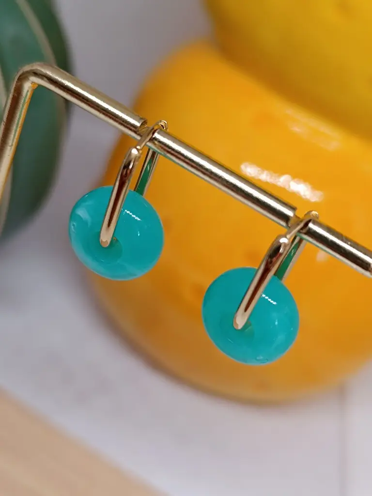 Créoles anneau ovale breloque ronde en résine bleu turquoise.webp